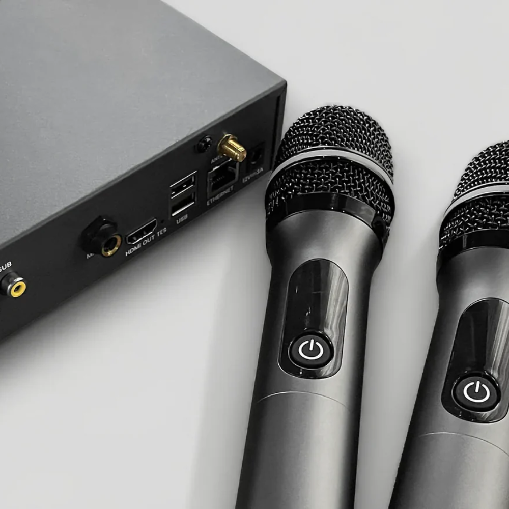 Close-up of ISEE Essential device ports with professional wireless microphones